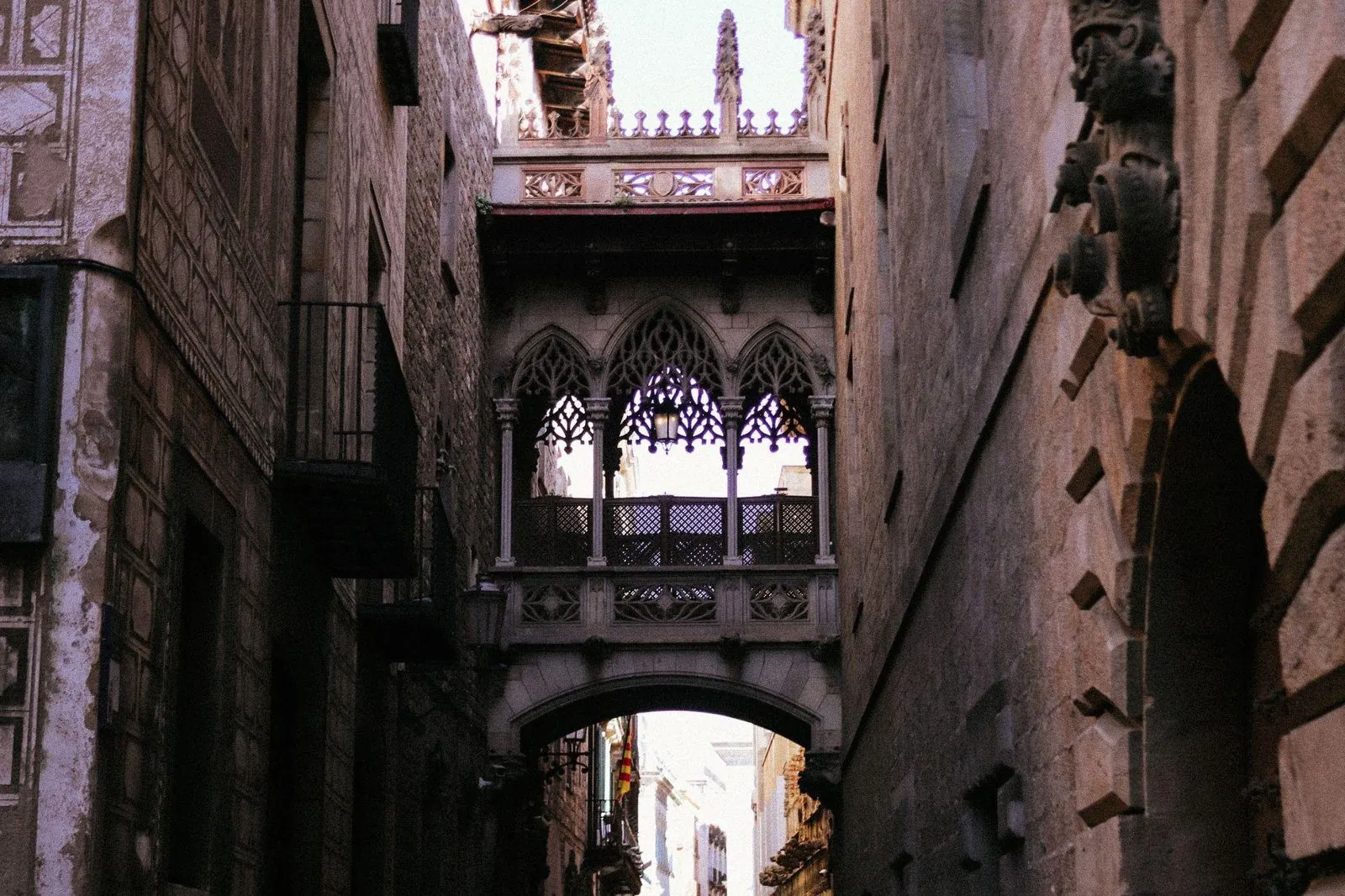 The Bishop's Bridge over a narrow Gothic Quarter street